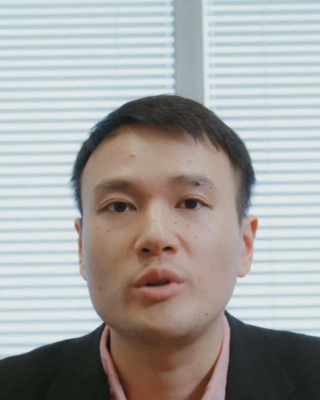 Nextly Camera view: the same man looking into the lens, with a soft brightening